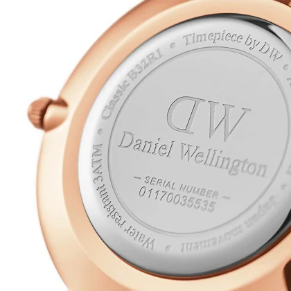 ساعت دنیل ولینگتون زنانه بند چرم عسلی قاب رز صفحه مشکی DW-4743-32-L