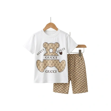 ست تیشرت شلوارک بچگانه مدل GUCCI سفید طلایی سایز 40,45