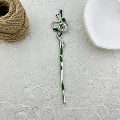 کانزاشی مو زنانه فلزی طرح گل و مار با جزئیات سبز مدل سروینا