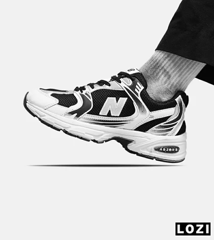 کفش کتانی مردانه و زنانه مشکی سفید NEW BALANCE 530