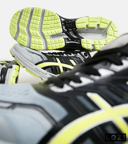 کفش کتانی مردانه مشکی طوسی لیمویی ASICS GT 2000