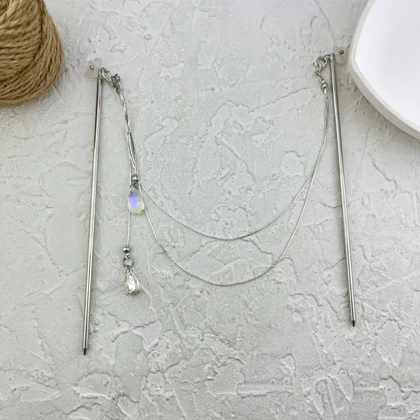 کانزاشی مو زنانه فلزی نقره‌ای آویزدار دو لاین با کریستال شفاف مدل لومیرا
