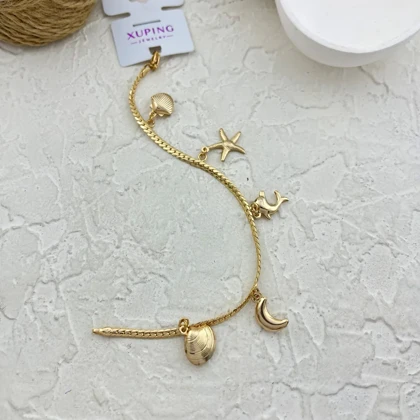 دستبند زنانه ژوپینگ طرح کارتیه با آویز دریایی و صدف