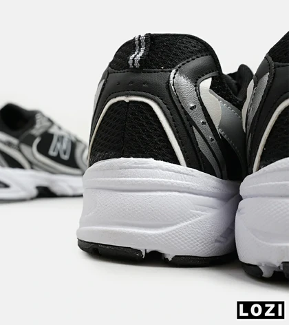 کفش کتانی مردانه و زنانه مشکی نقره ای NEW BALANCE 530