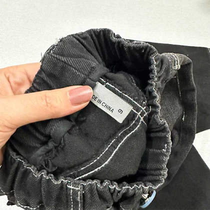 شلوار جین سنگ شور شده با دوخت سفید