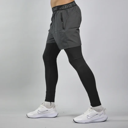 شلوارک و لگ سرهمی ورزشی مردانه آندر آرمور مدل Heat Gear-187230 طوسی تیره