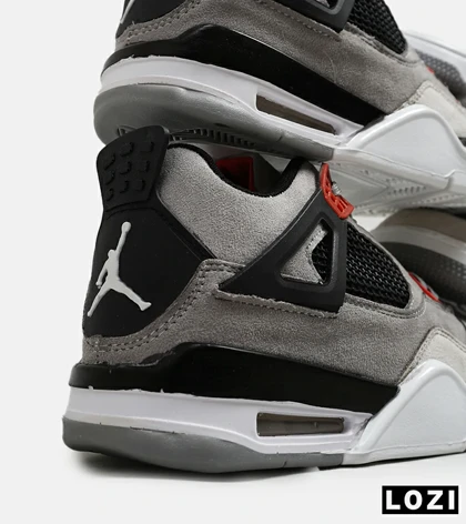 کتانی ساق‌دار بزرگ پا طوسی مشکی قرمز Nike air jordan 4