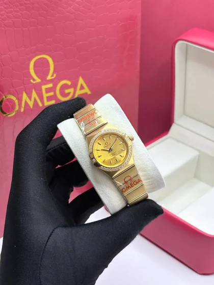 ساعت امگا زنانه طلایی دورنگین