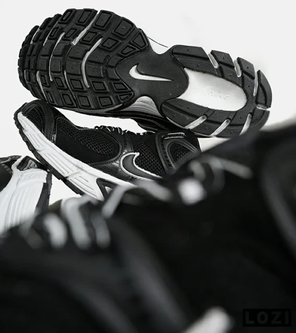 کفش کتانی مردانه و زنانه مشکی سفید نایک NIKE v5 RNR مدل 7329