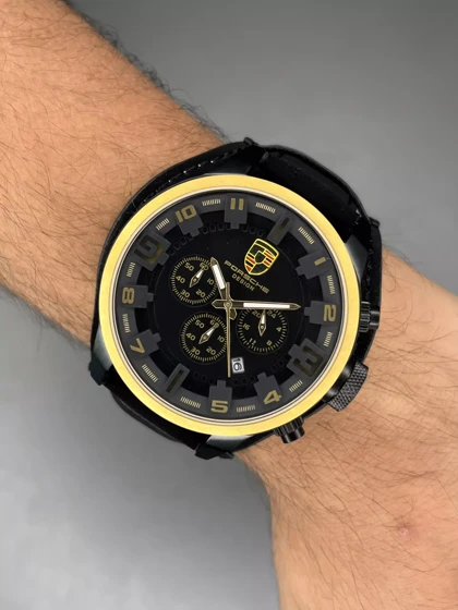 ساعت مچی پورش دیزاین بند جیر صفحه مشکی قاب طلایی Porsche Design