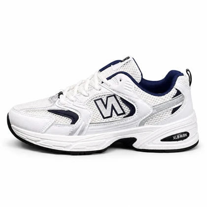 کتانی خارجی مردانه مدل نیوبالانس 530 سفید سرمه ای New Balance
