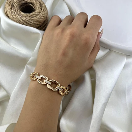 دستبند زنانه ژوپینگ مدل آمیتیس طرح زنجیری نگین‌دار طلایی