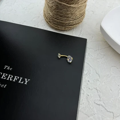 پیرسینگ ناف استیل نگین‌دار با درخشش الماس