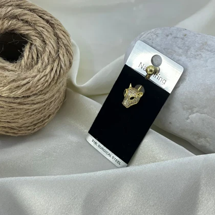 پیرسینگ ناف زنانه مدل پلنگ طلایی