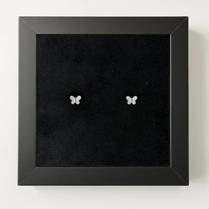 پیرسینگ نقره گوش طرح پروانه نگین‌دار (جفت)