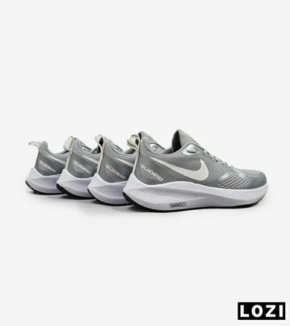 کفش کتانی زنانه و مردانه طوسی Nike guide 10