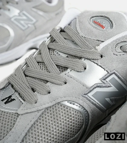 کفش کتانی طوسی NEW BALANCE 2002R