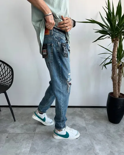 شلوار مام فیت رنگ خاص زاپ‌دار LEVIS