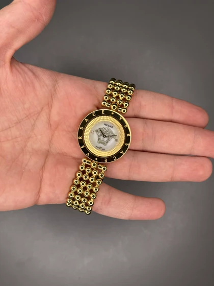 ساعت مچی ورساچه قاب چرخشی طلایی صفحه سفید Versace