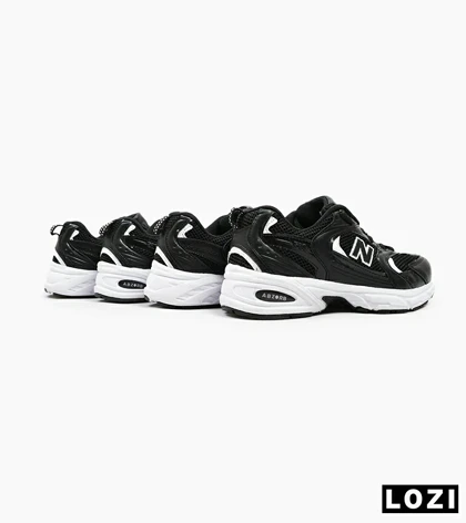 کفش کتانی بزرگ پا مشکی سفید NEW BALANCE 530