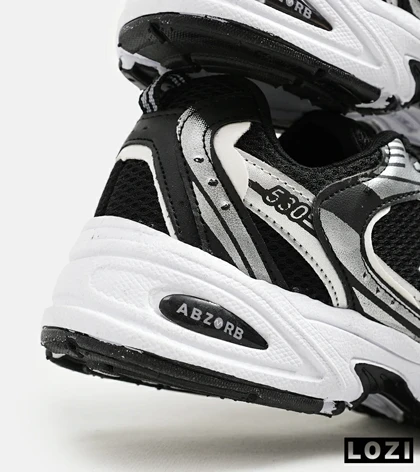 کفش کتانی مردانه و زنانه مشکی نقره ای NEW BALANCE 530