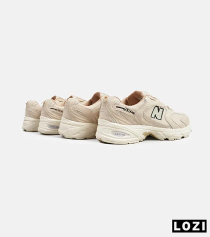 کفش کتانی مردانه و زنانه کرم NEW BALANCE 530