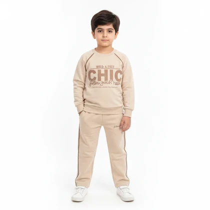 ست بلوز شلوار بچگانه دورس طرح CHIC کرمی