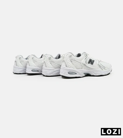 کفش کتانی مردانه و زنانه سفید طوسی NEW BALANCE 530