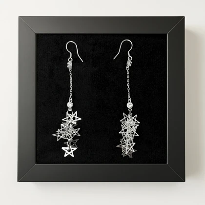 گوشواره نقره آویز ستاره‌ای نگین‌دار