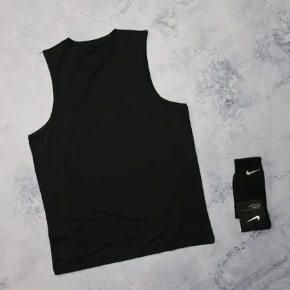 ست تاپ و شلوارک کشاله دار نایکی با 2 رنگ + جوراب