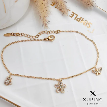 پابند ژوپینگ آویز پروانه و گل نگین‌دار طلایی