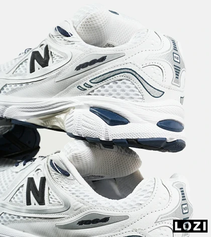 کفش کتانی مردانه و زنانه سفید مشکی NEW BALANCE 1064 V.2