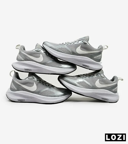 کفش کتانی زنانه و مردانه طوسی Nike guide 10