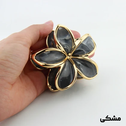 کلیپس دخترانه مدل سنگی طرح گل دور طلایی