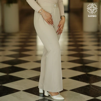 شلوار زنانه کرم مدل دمپاگشاد