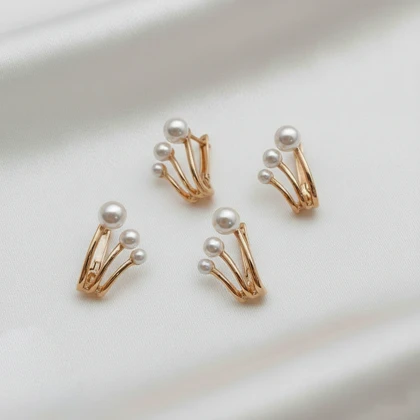 گوشواره ژوپینگ طرح پنجه مرواریدی