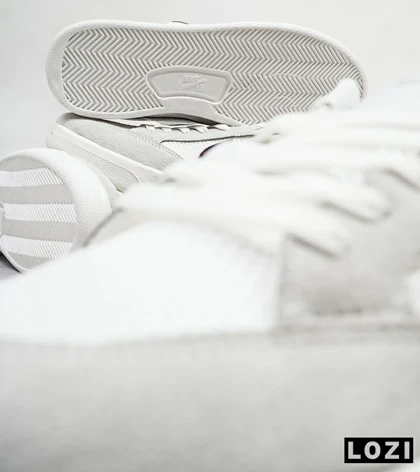 کفش کتانی مردانه سفید طوسی NIKE SB