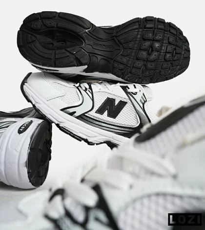 کفش کتانی مردانه و زنانه سفید طوسی مشکی NEW BALANCE 530