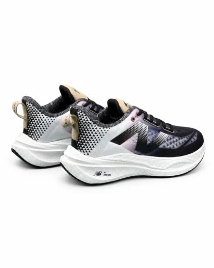 کفش کتانی رانینگ مردانه نیوبالانس زیره بست سفید سرمه ای New BALANCE