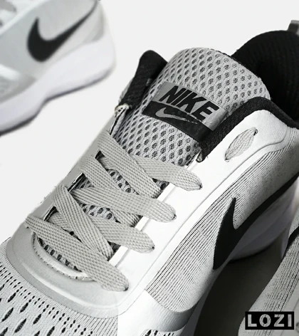 کفش کتانی مردانه و زنانه طوسی مشکی Nike guide 10