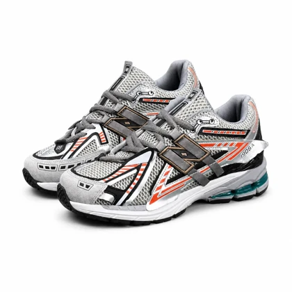 کتانی مردانه نیوبالانس طوسی نارنجی New BALANCE 1906