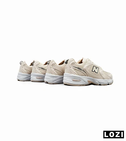 کفش کتانی مردانه و زنانه کرم NEW BALANCE 530