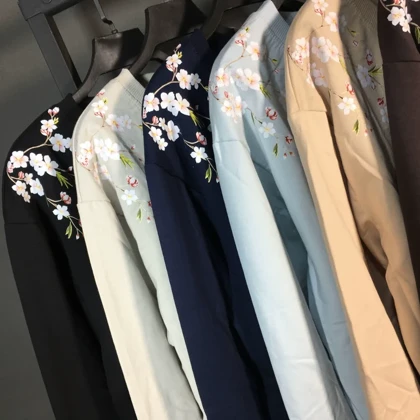بلوز دورس زنانه طرح سرشانه گل‌دار چاپی