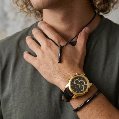پکیج ساعت romanson مشکی طلایی مدل B62 + ست گردنبند و بنگل پیچ خورده مشکی