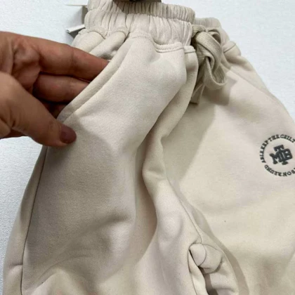 شلوار جاکر راحتی لاینردار بچه گانه کرم