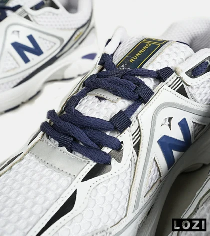کفش کتانی مردانه و زنانه سفید سرمه ای NEW BALANCE 1064 V.2