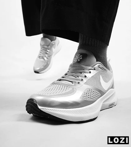 کفش کتانی زنانه و مردانه طوسی Nike guide 10