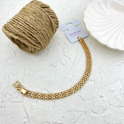 دستبند زنانه طرح حصیری با جلوه طلایی برند ژوپینگ