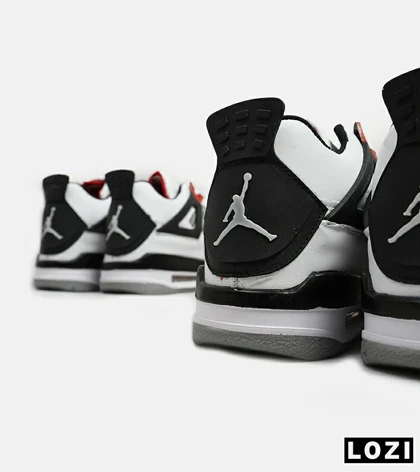 کتانی ساق‌دار بزرگ پا سفید قرمز Nike air jordan 4