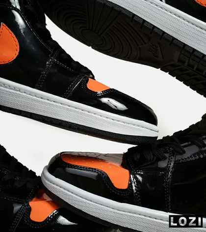 کفش کتانی مردانه و زنانه ساق‌دار مشکی نارنجی ورنی NIKE jordan 1 مدل 6219